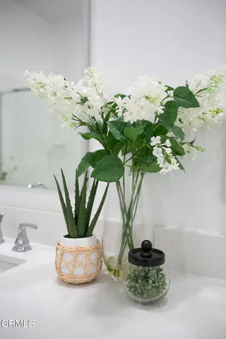 a vase of flowers sitting on a table