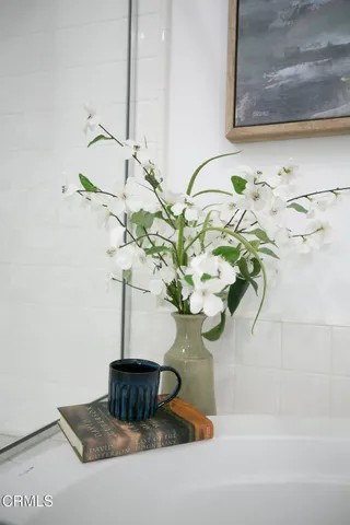 a view of a house with swimming pool and porch with furniture