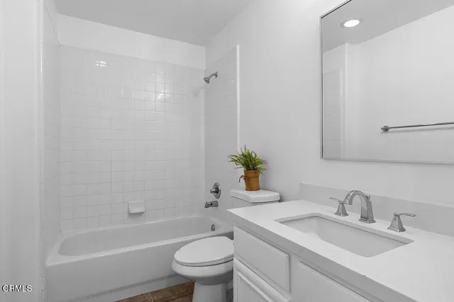 a view of a park with large trees