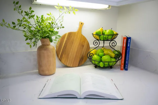 a vase of flowers sitting on a table