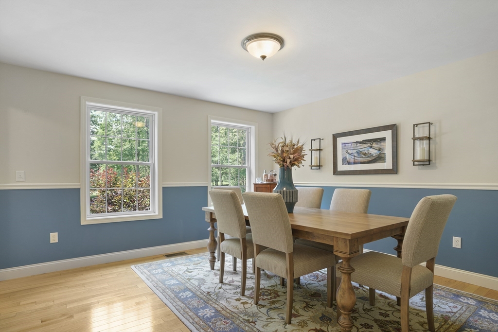 18 Westgate Road Mont Vernon, NH 03057 - Photo 13 of 42 a view of a dining room with furniture window and wooden floor