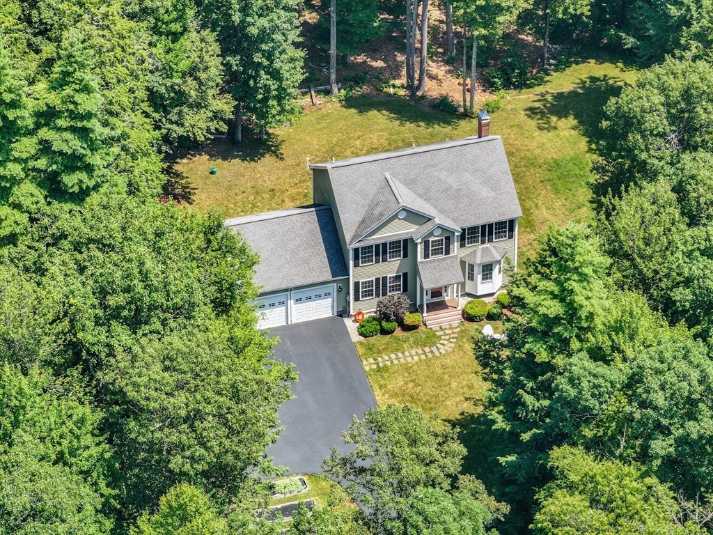 18 Westgate Road Mont Vernon, NH 03057 - Photo 31 of 42 an aerial view of a house with swimming pool and garden