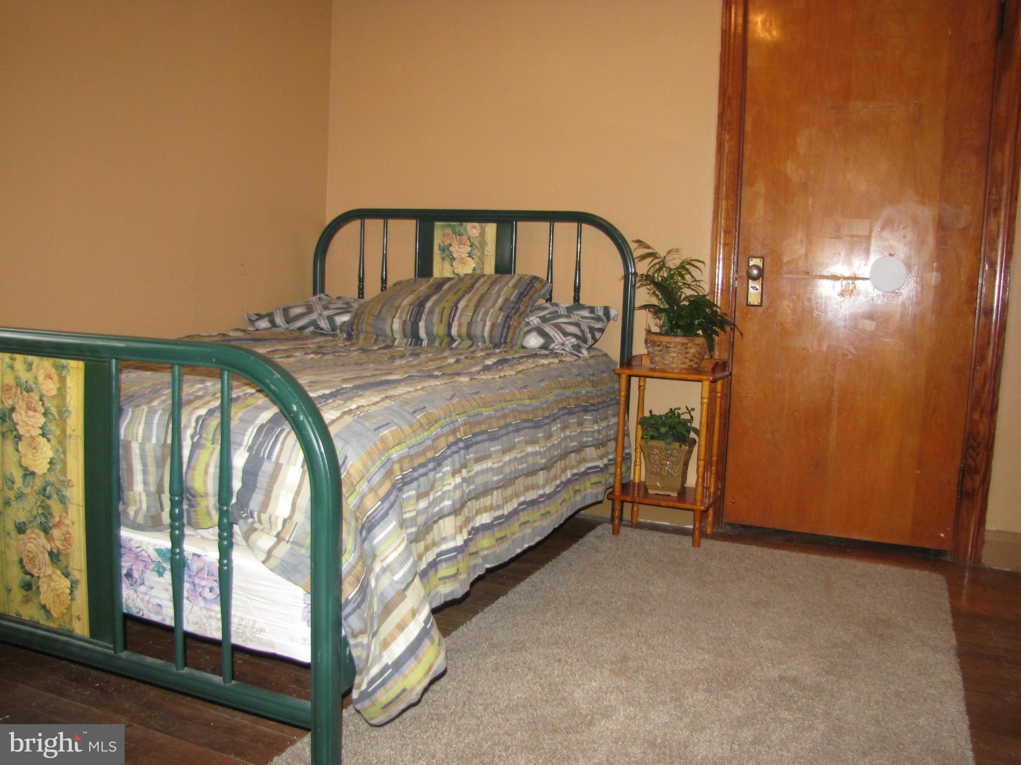 27 Brookfield Road Pasadena, MD 21122 - Photo 13 of 20 a view of spacious bedroom with a window