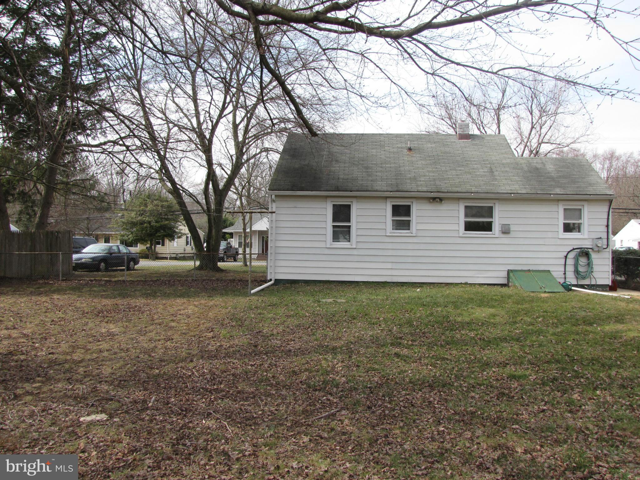 27 Brookfield Road Pasadena, MD 21122 - Photo 20 of 20 a view of a house with a yard