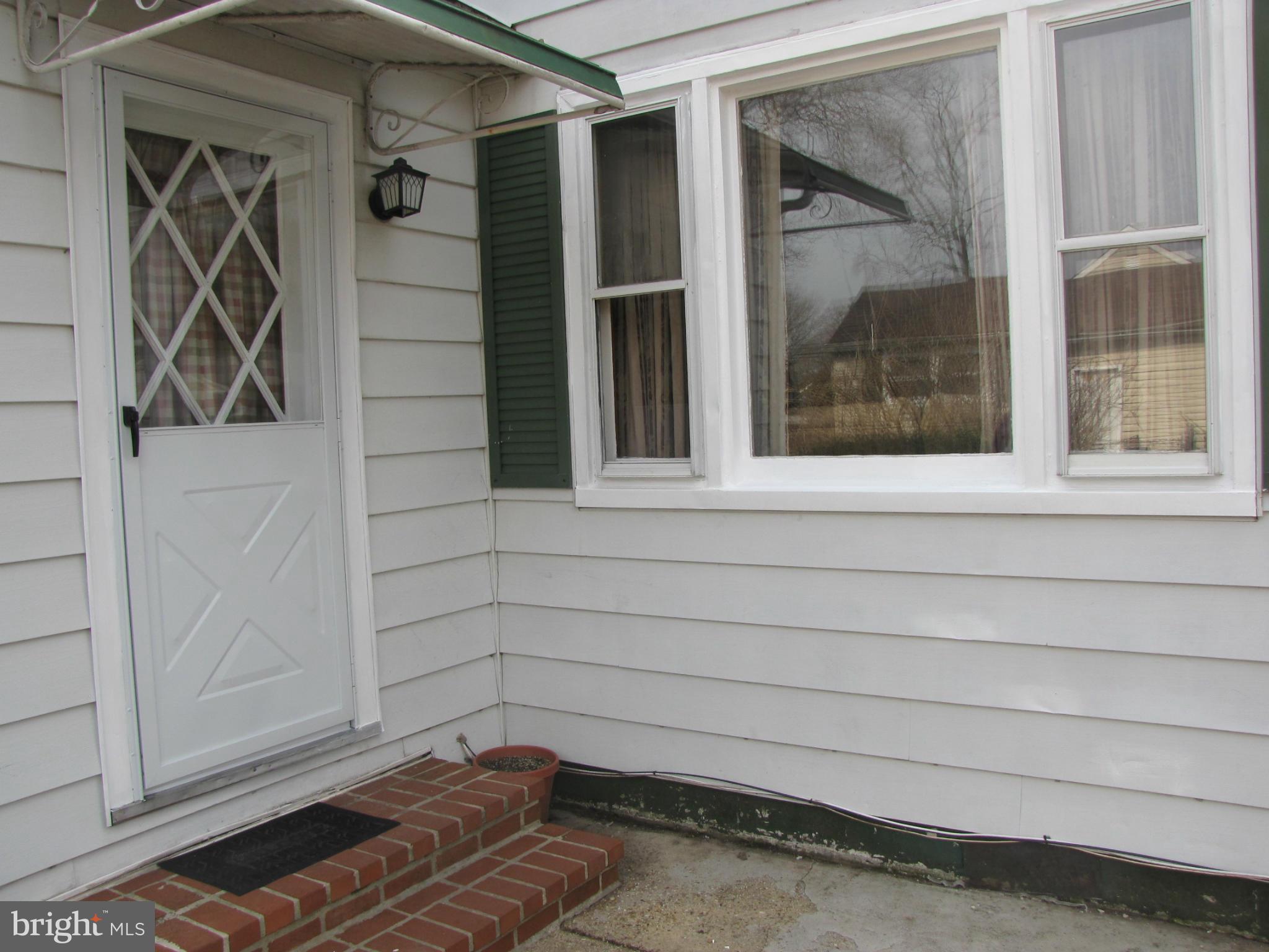 27 Brookfield Road Pasadena, MD 21122 - Photo 3 of 20 a view of a door of a house