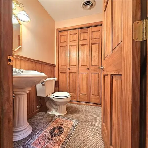 a bedroom with a bed and a table in it