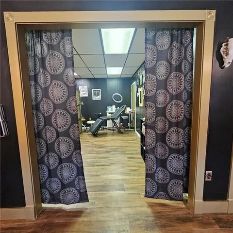 a room with lots of gym equipment