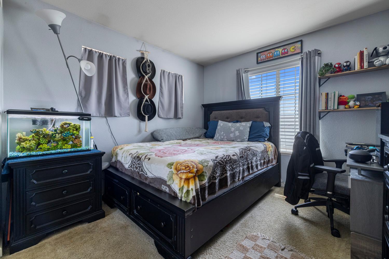 3145 Sweet Pea Avenue Merced, CA 95341 - Photo 22 of 25 a bedroom with a bed and a closet