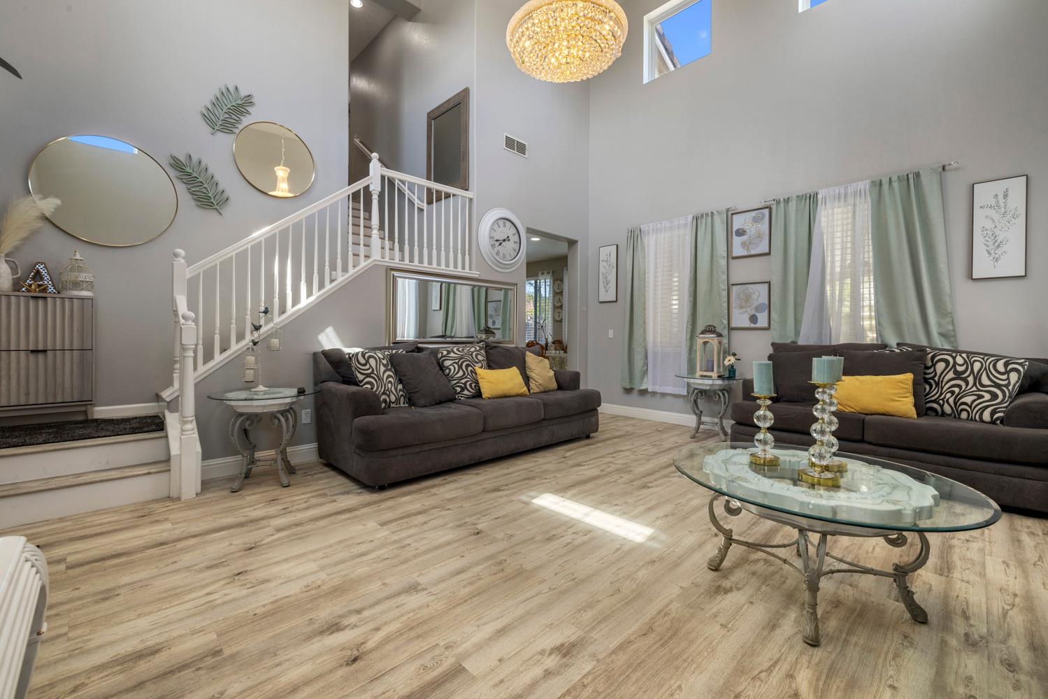 3145 Sweet Pea Avenue Merced, CA 95341 - Photo 7 of 25 a living room with furniture and a wooden floor