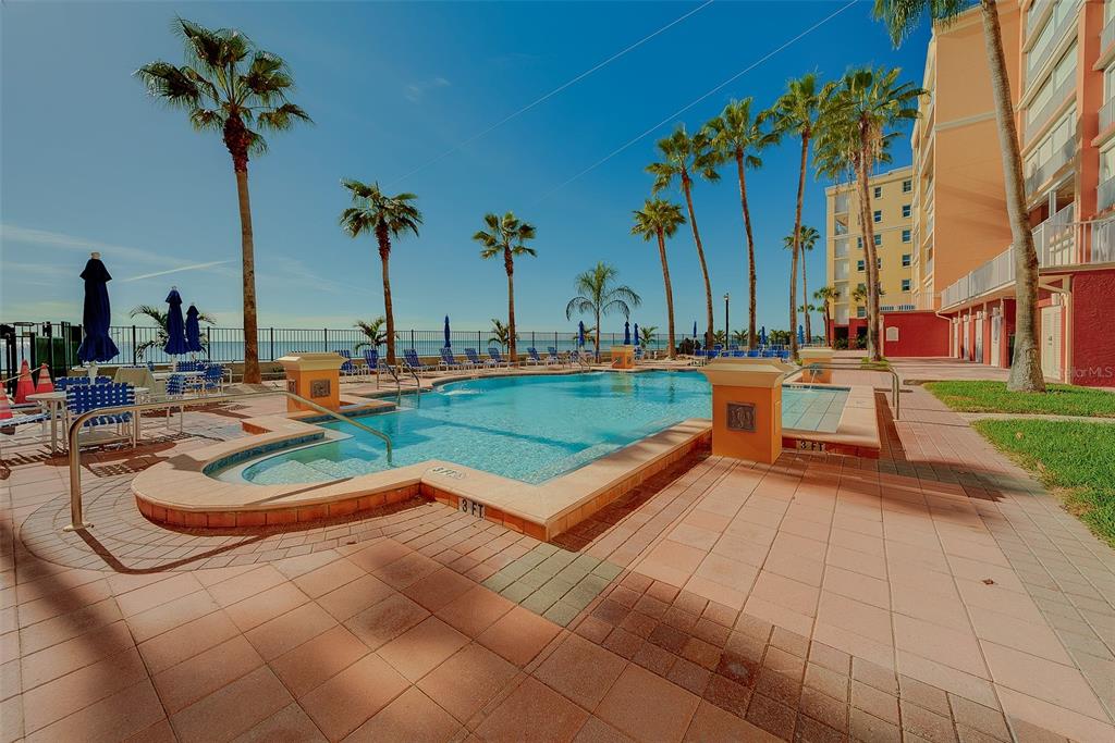 16450 Gulf Boulevard, Unit 565 North Redington Beach, FL 33708 - Photo 17 of 54 swimming pool with outdoor seating