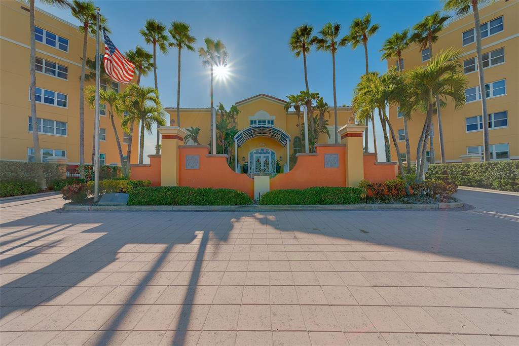16450 Gulf Boulevard, Unit 565 North Redington Beach, FL 33708 - Photo 27 of 52 a front view of a building with garden