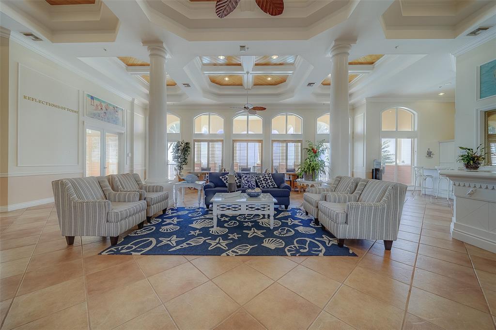 16450 Gulf Boulevard, Unit 565 North Redington Beach, FL 33708 - Photo 31 of 54 a living room with furniture and a large window