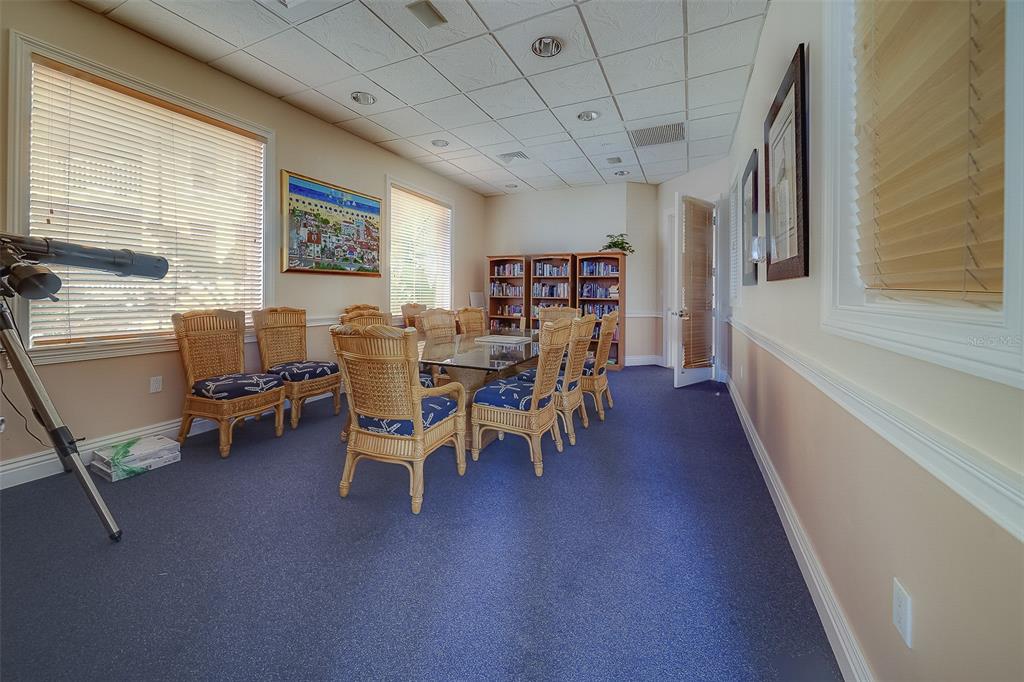 16450 Gulf Boulevard, Unit 565 North Redington Beach, FL 33708 - Photo 32 of 54 a view of a livingroom with furniture and a window