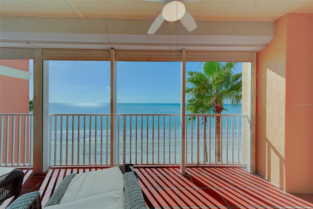 16450 Gulf Boulevard, Unit 565 North Redington Beach, FL 33708 - Photo 5 of 54 a view of a balcony with furniture