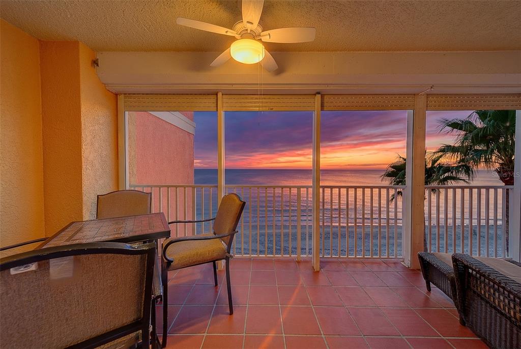 16450 Gulf Boulevard, Unit 565 North Redington Beach, FL 33708 - Photo 5 of 52 a view of a chair and table in the balcony