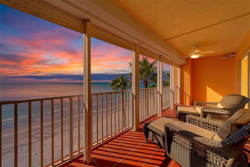 16450 Gulf Boulevard, Unit 565 North Redington Beach, FL 33708 - Photo 51 of 54 a balcony with wooden floor