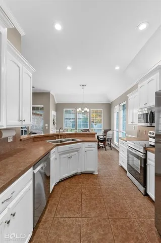 a large kitchen with cabinets