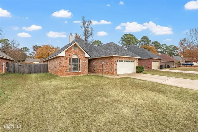 a view of outdoor space yard and front view of a house