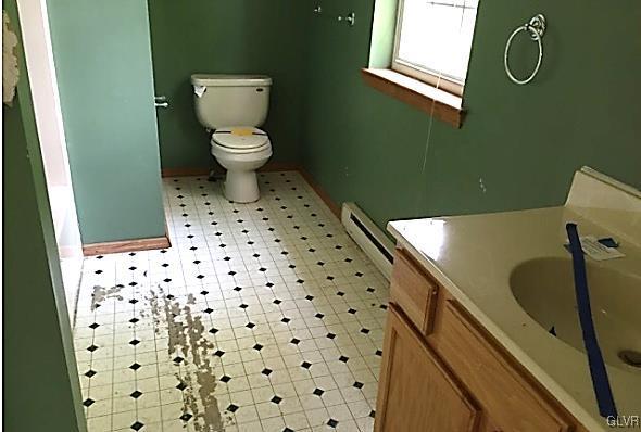 204 Alpine Road Henryville, PA 18332 - Photo 13 of 13 a bathroom with a sink and a toilet