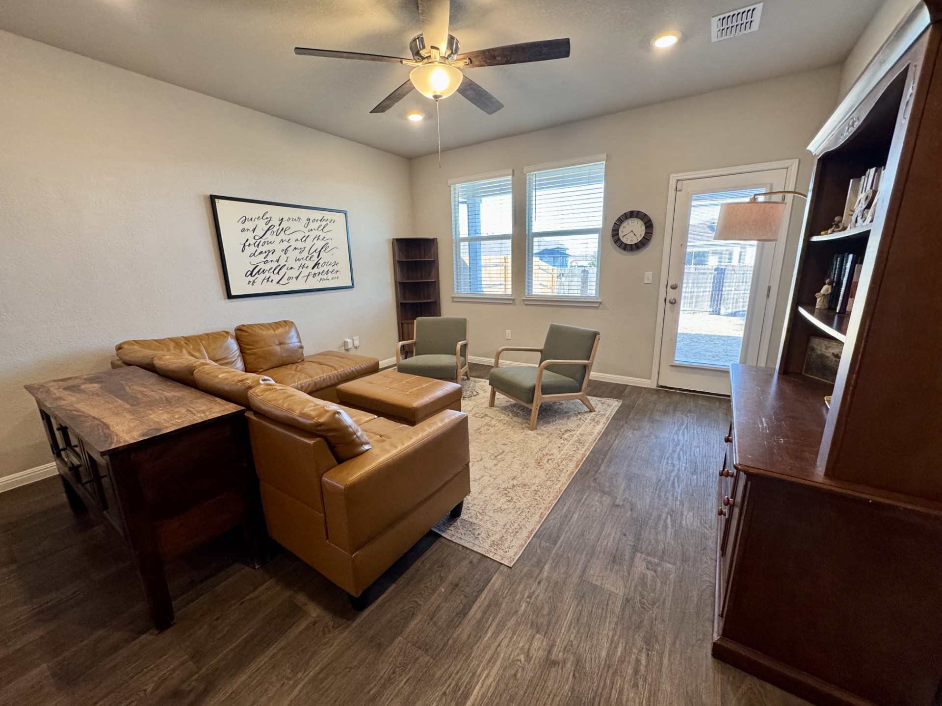 107 Hamilton Pool Lane Bastrop, TX 78602 - Photo 11 of 22 Living room with ceiling fan, recessed lighting.