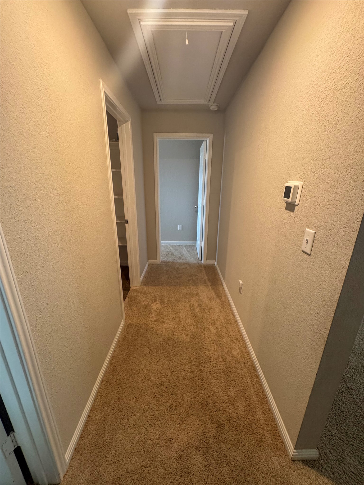 107 Hamilton Pool Lane Bastrop, TX 78602 - Photo 19 of 22 Upstairs hallway.