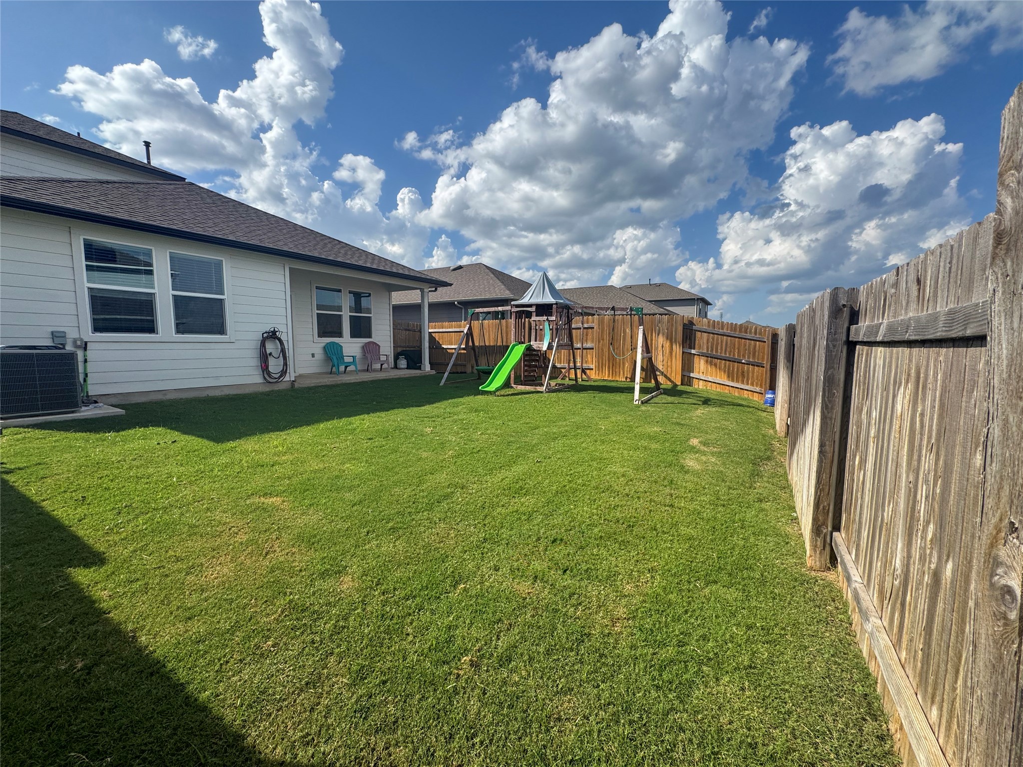 107 Hamilton Pool Lane Bastrop, TX 78602 - Photo 21 of 22 Fenced backyard.