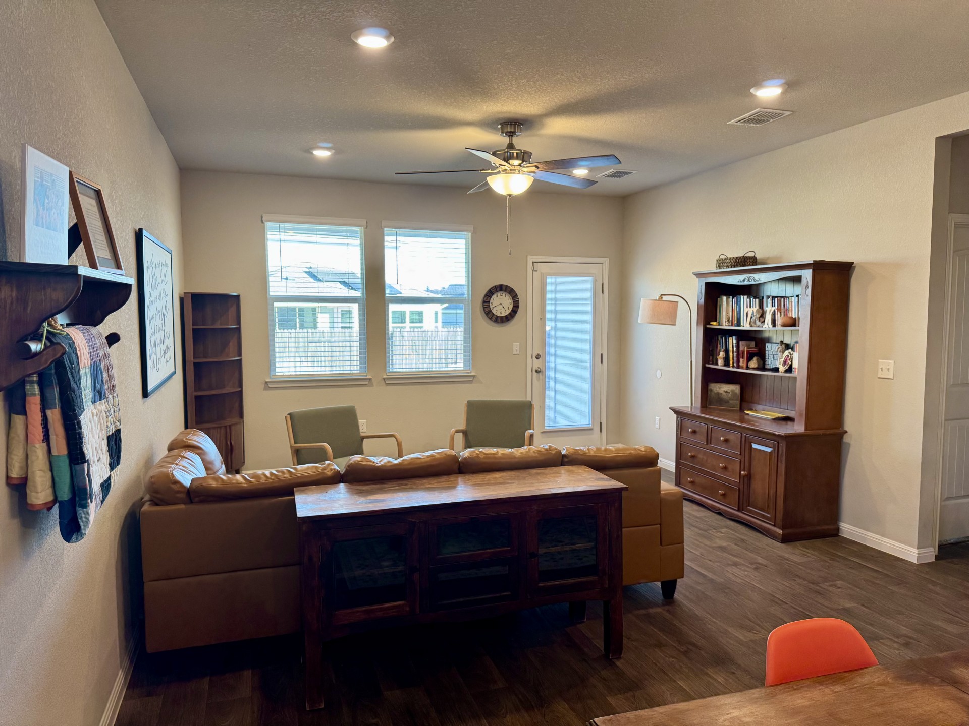 107 Hamilton Pool Lane Bastrop, TX 78602 - Photo 10 of 22 Living room with ceiling fan, recessed lighting.