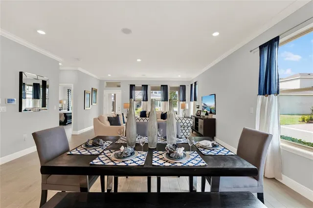 a view of a dining room with furniture