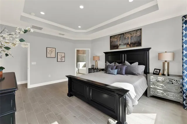 a bedroom with bed and window