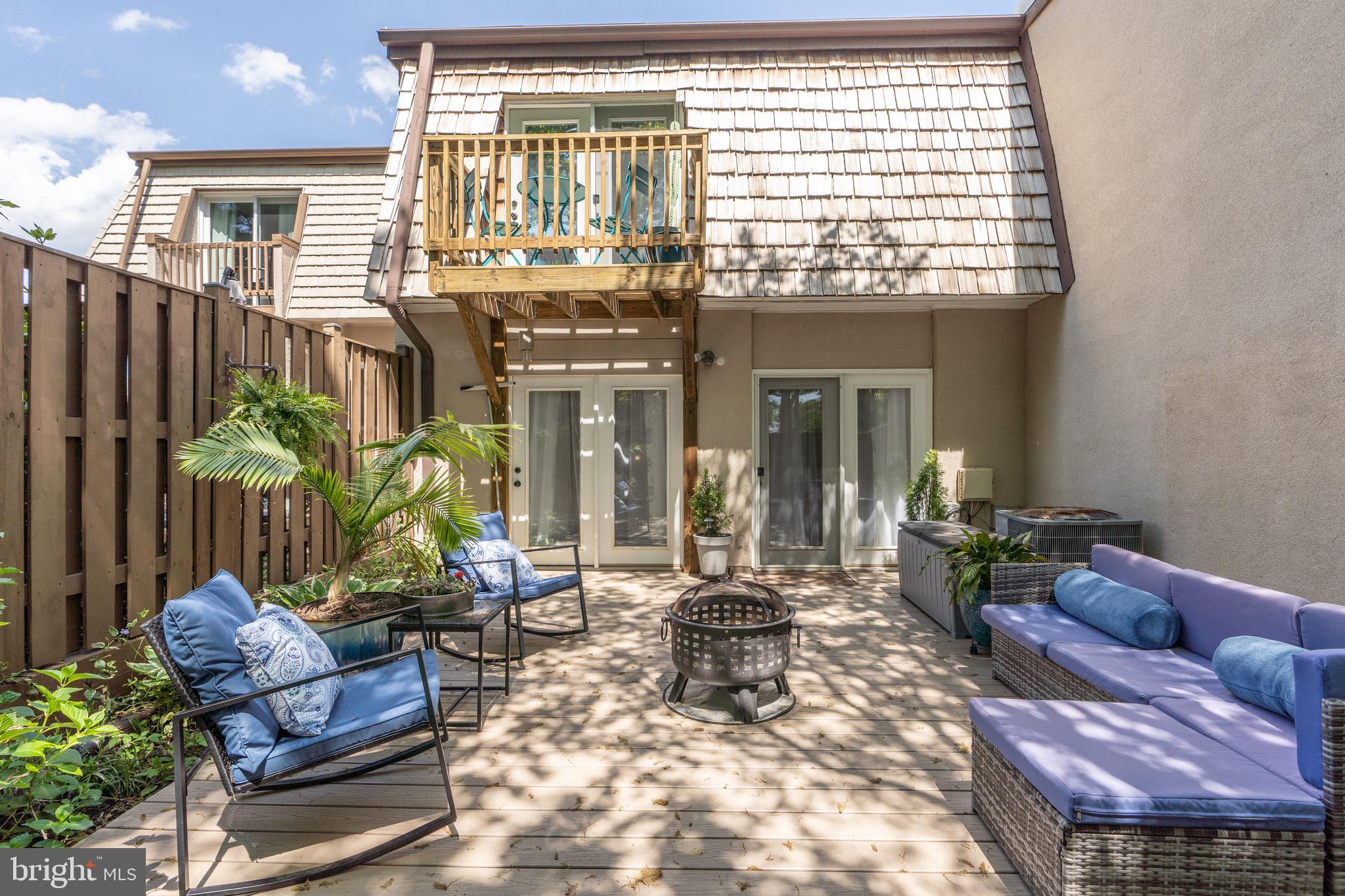 1656 Valencia Way Reston, VA 20190 - Photo 11 of 50 Trex deck is located just off the living room