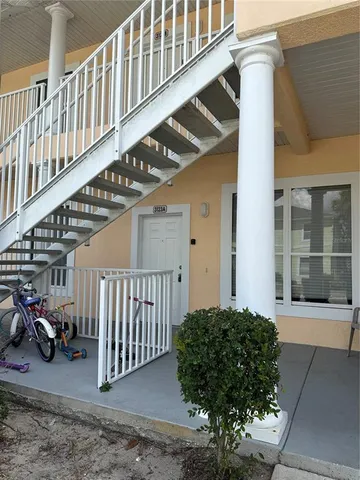 a view of a porch with seating space