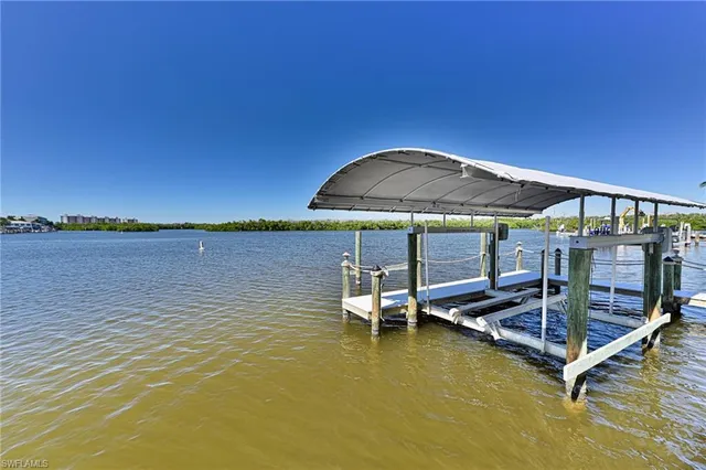 a view of outdoor space with swimming pool and lounge chair