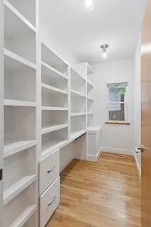 a room with cabinets and window