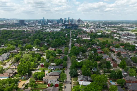 an aerial view of a city with lots of residential buildings