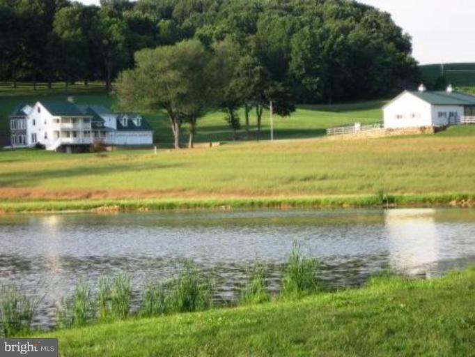 7702 Marker Road Middletown, MD 21769 - Photo 22 of 30 a view of a lake with a big yard