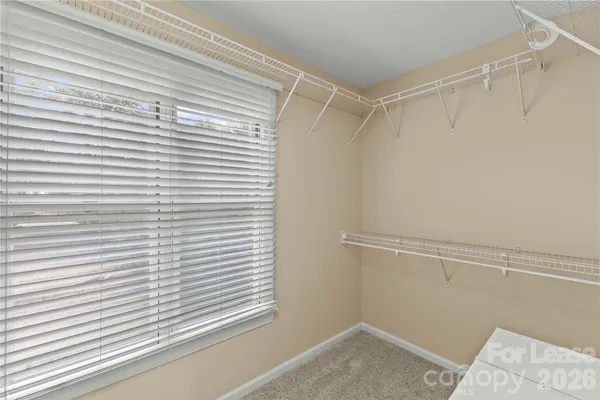 a view of a room that has a window in it