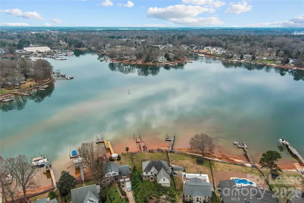 an aerial view of a house with outdoor space