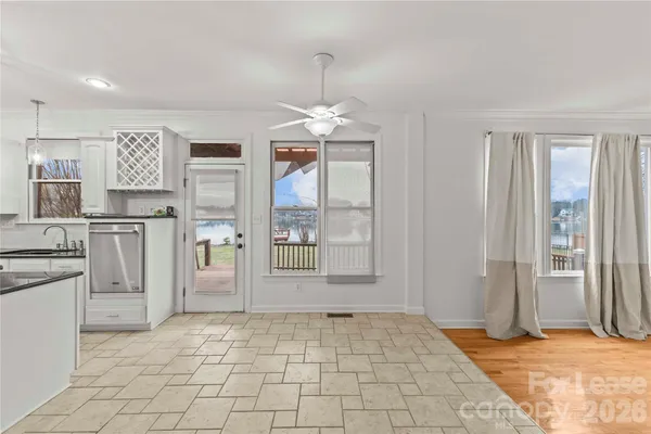 a view of a kitchen with a stove cabinets and a kitchen