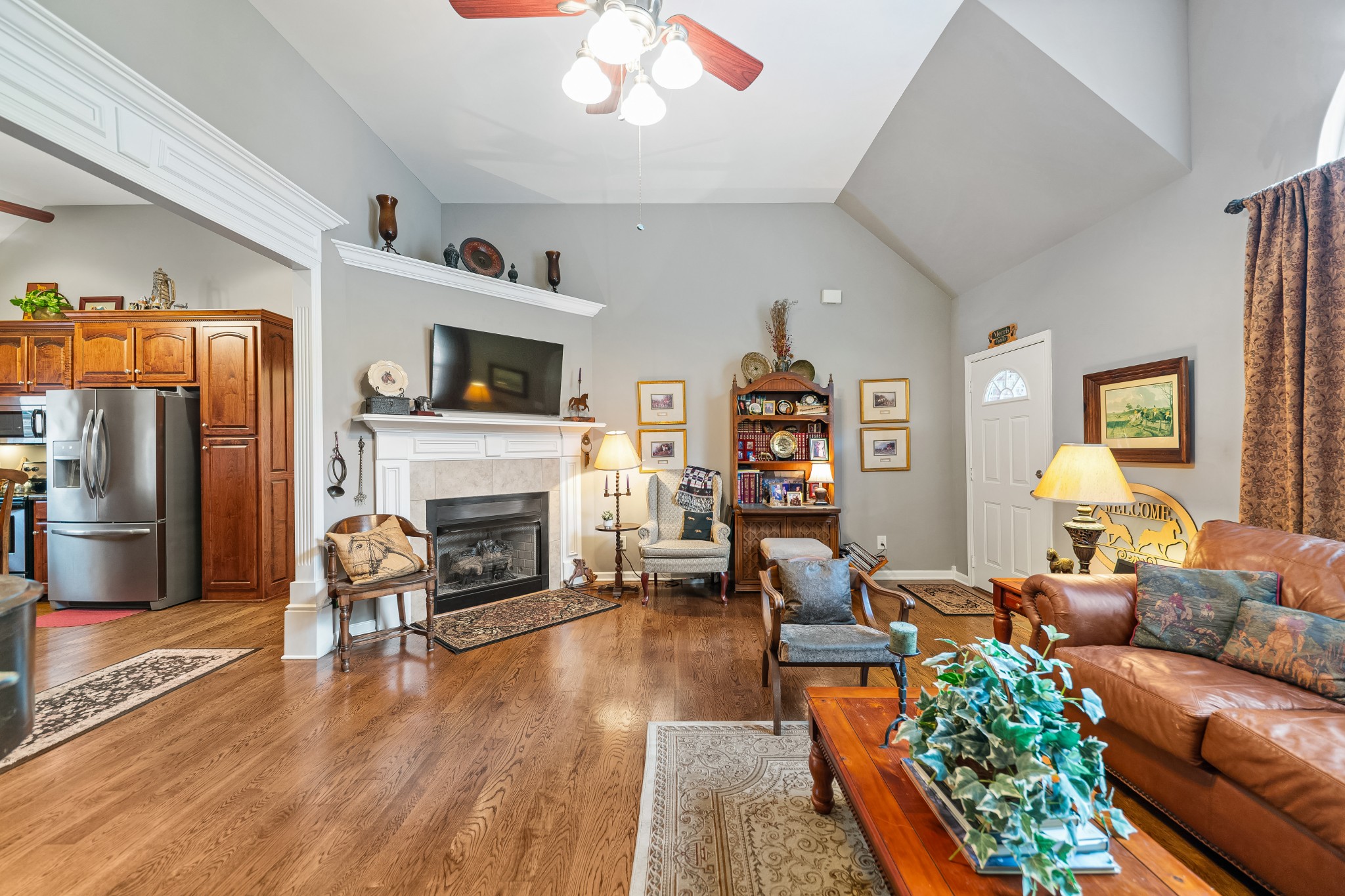 4862 Toll Dugger Road Culleoka, TN 38451 - Photo 14 of 96 a living room with furniture fireplace and flat screen tv