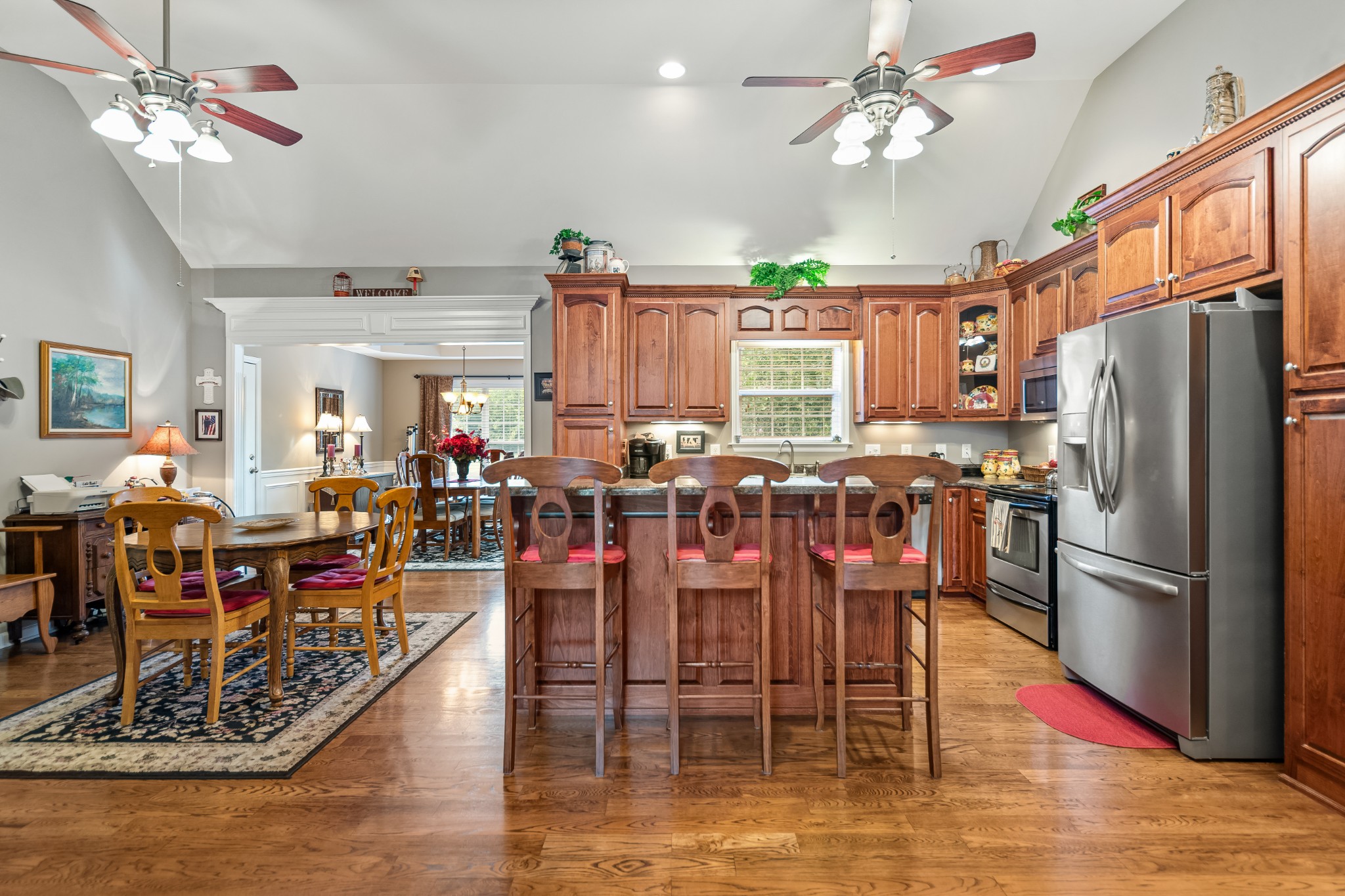 4862 Toll Dugger Road Culleoka, TN 38451 - Photo 21 of 96 a view of a dining room with furniture window and wooden floor
