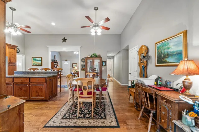 a bed room with a bed and a chair