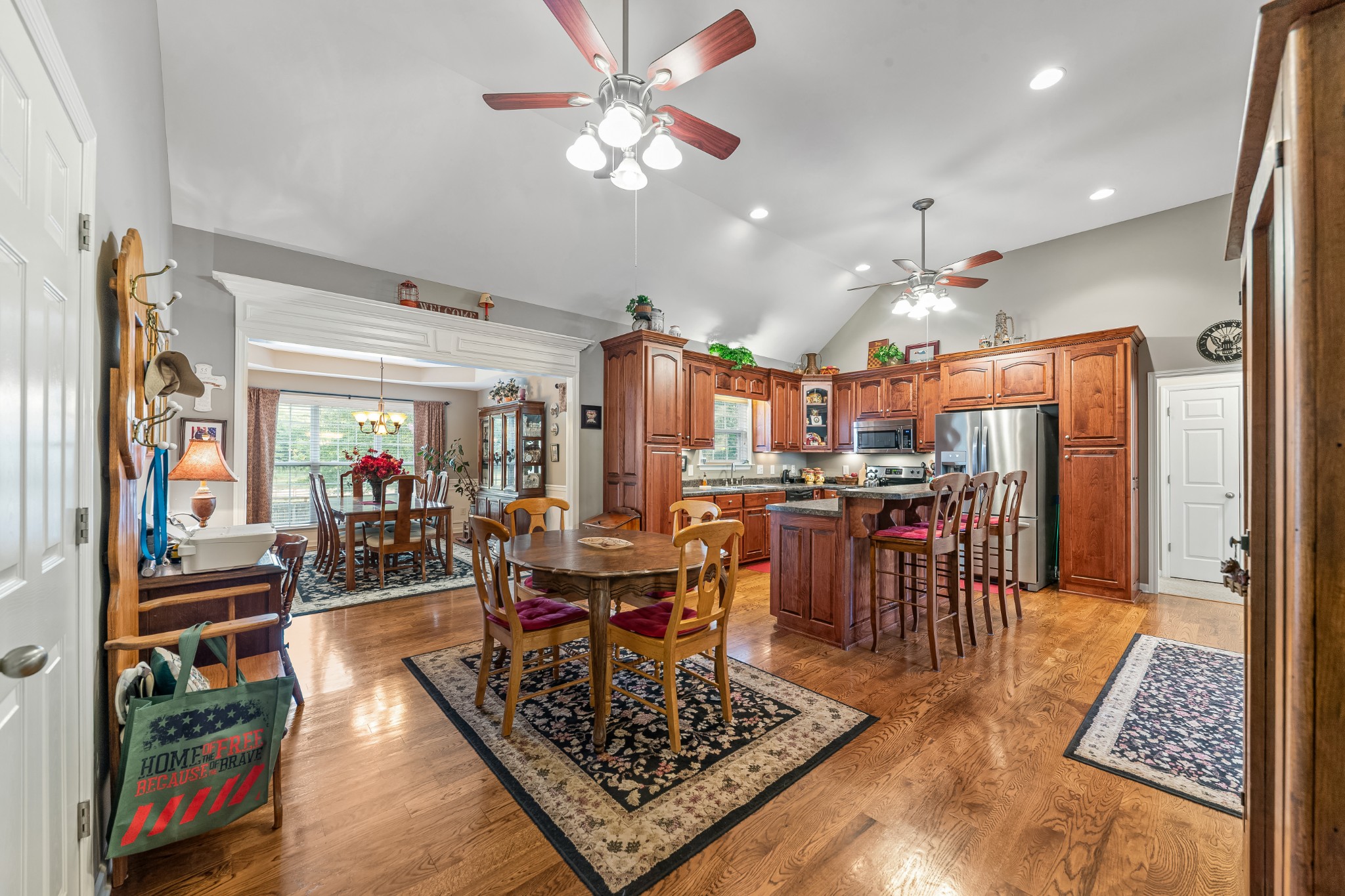 4862 Toll Dugger Road Culleoka, TN 38451 - Photo 32 of 96 a living room with lots of furniture and a chandelier