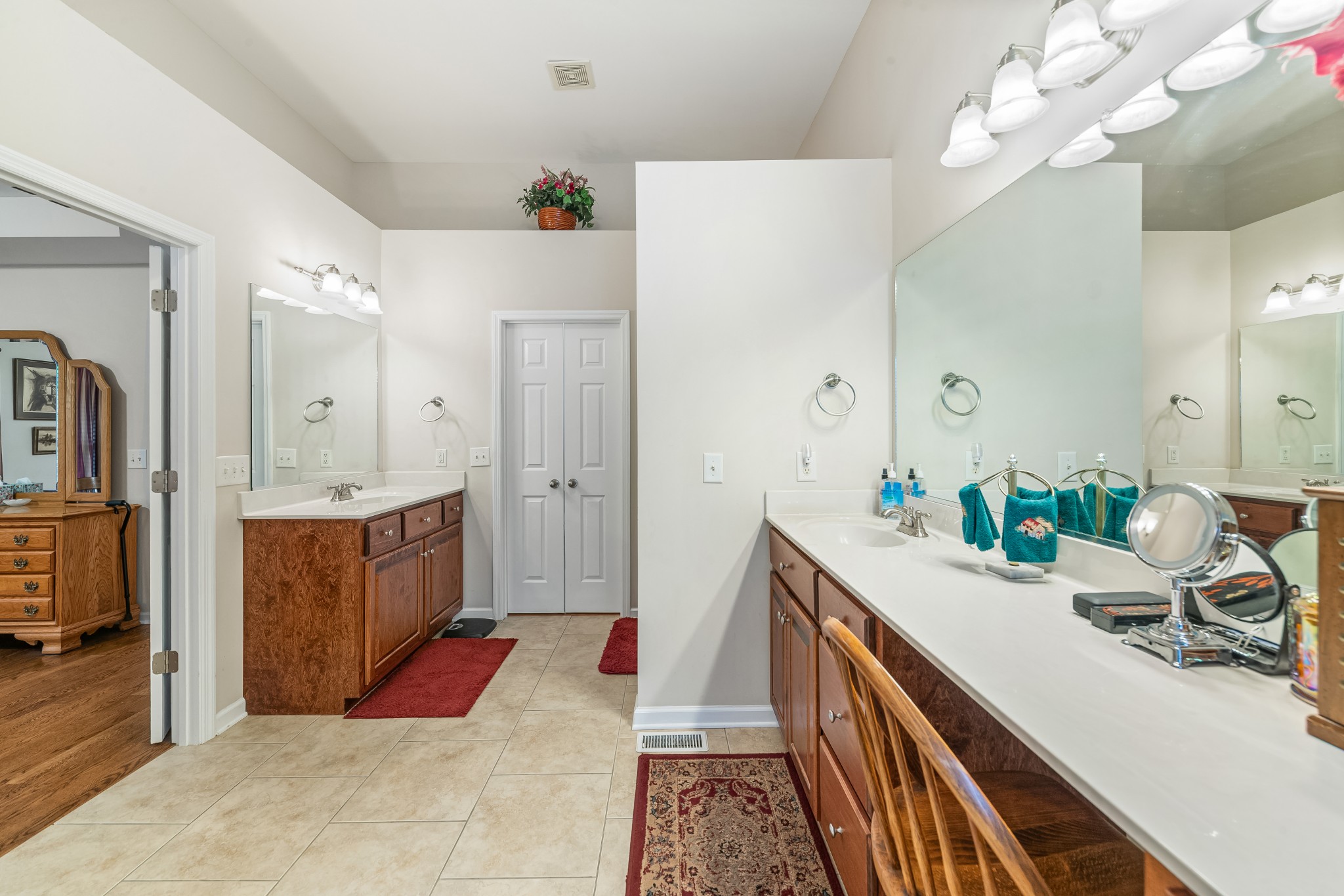 4862 Toll Dugger Road Culleoka, TN 38451 - Photo 44 of 96 a spacious bathroom with a double vanity sink mirror and shower