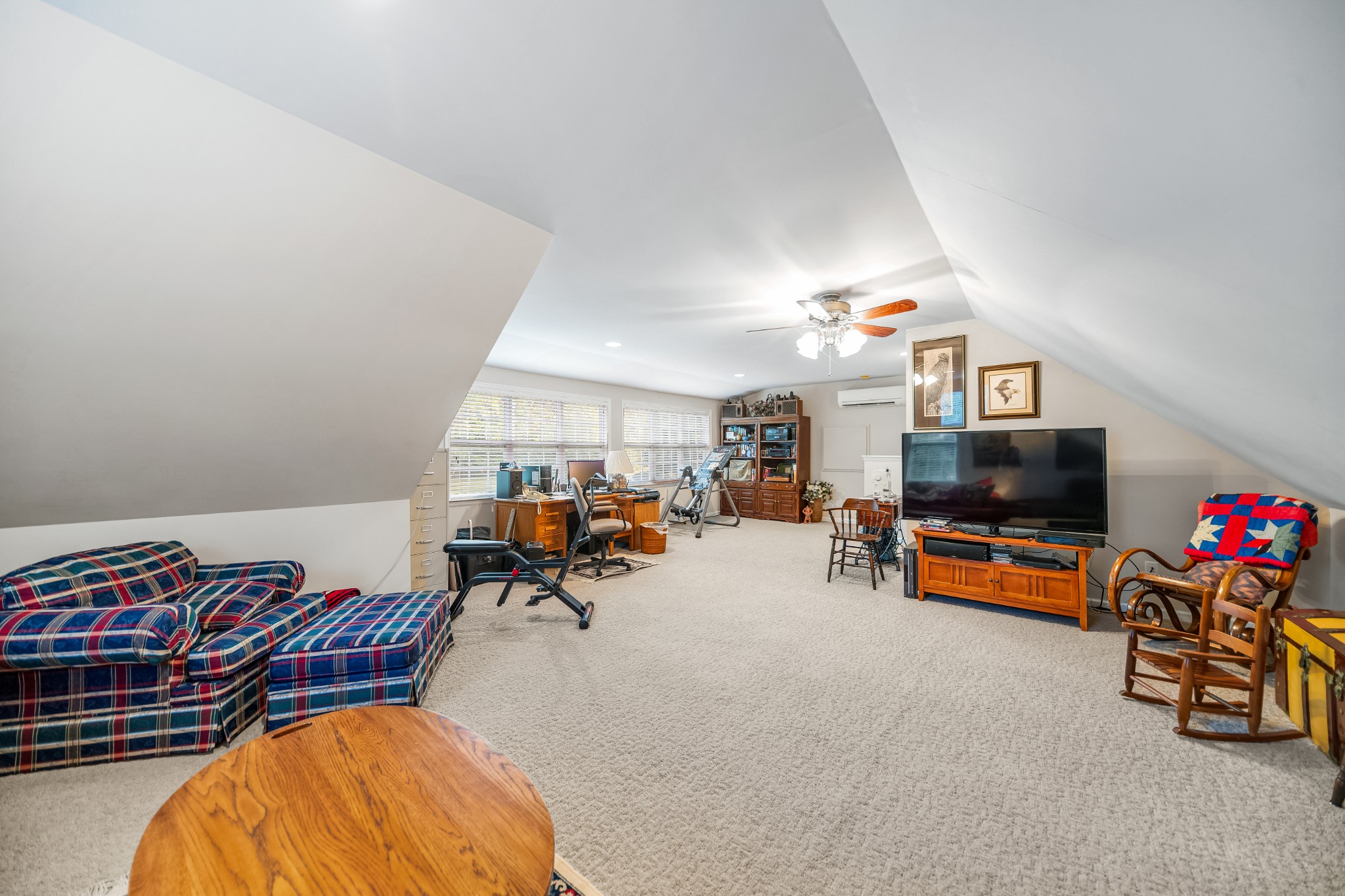 4862 Toll Dugger Road Culleoka, TN 38451 - Photo 56 of 96 a living room with furniture and a flat screen tv