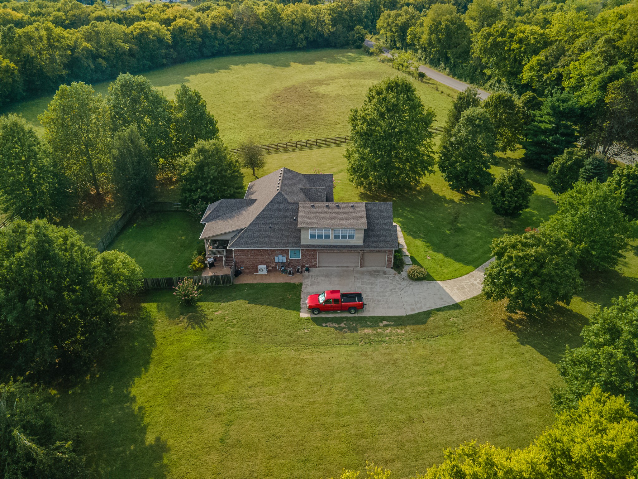 4862 Toll Dugger Road Culleoka, TN 38451 - Photo 66 of 96 an aerial view of a house with a yard and lake view
