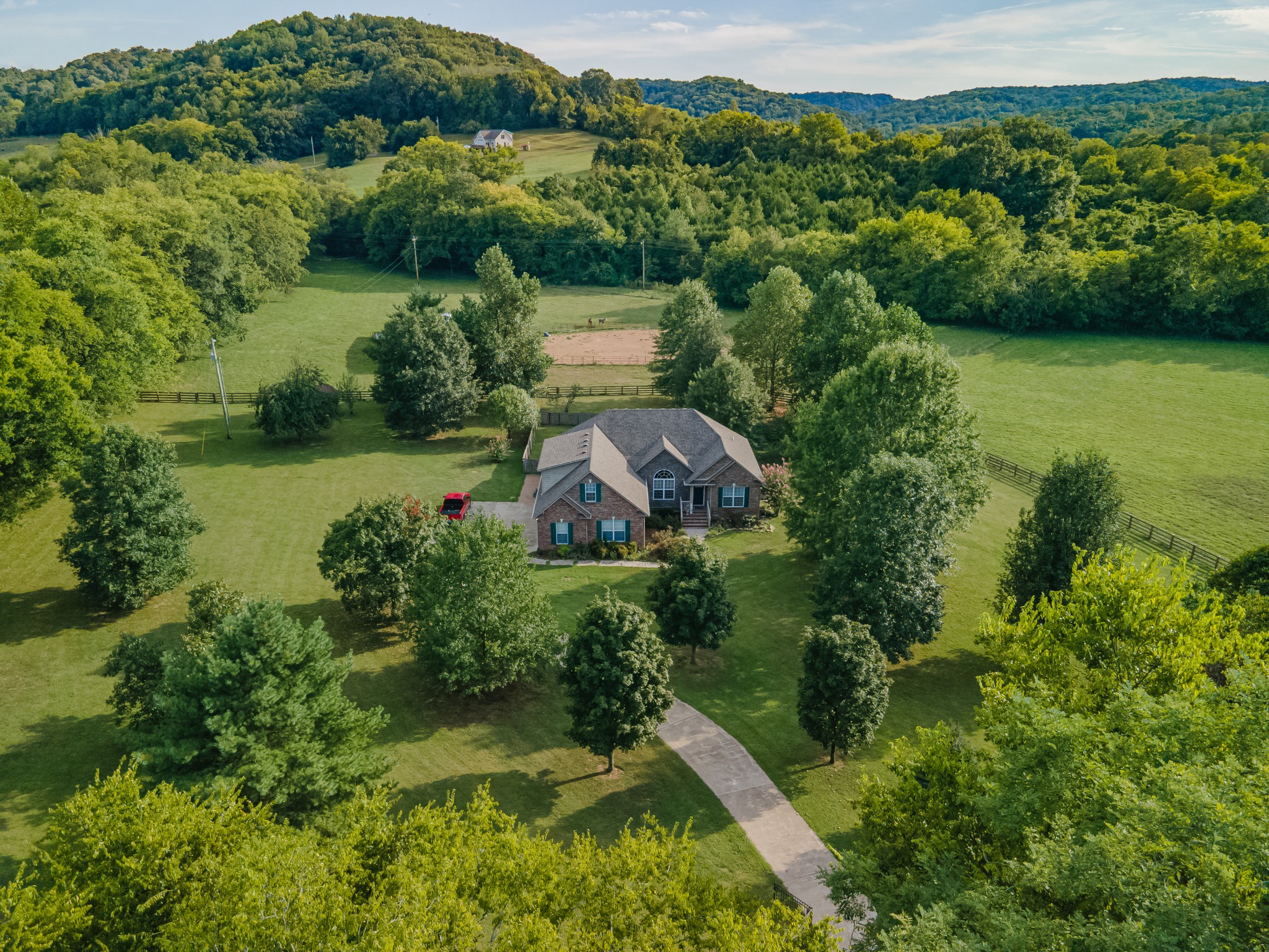 4862 Toll Dugger Road Culleoka, TN 38451 - Photo 69 of 96 an aerial view of green landscape with trees houses and mountain view