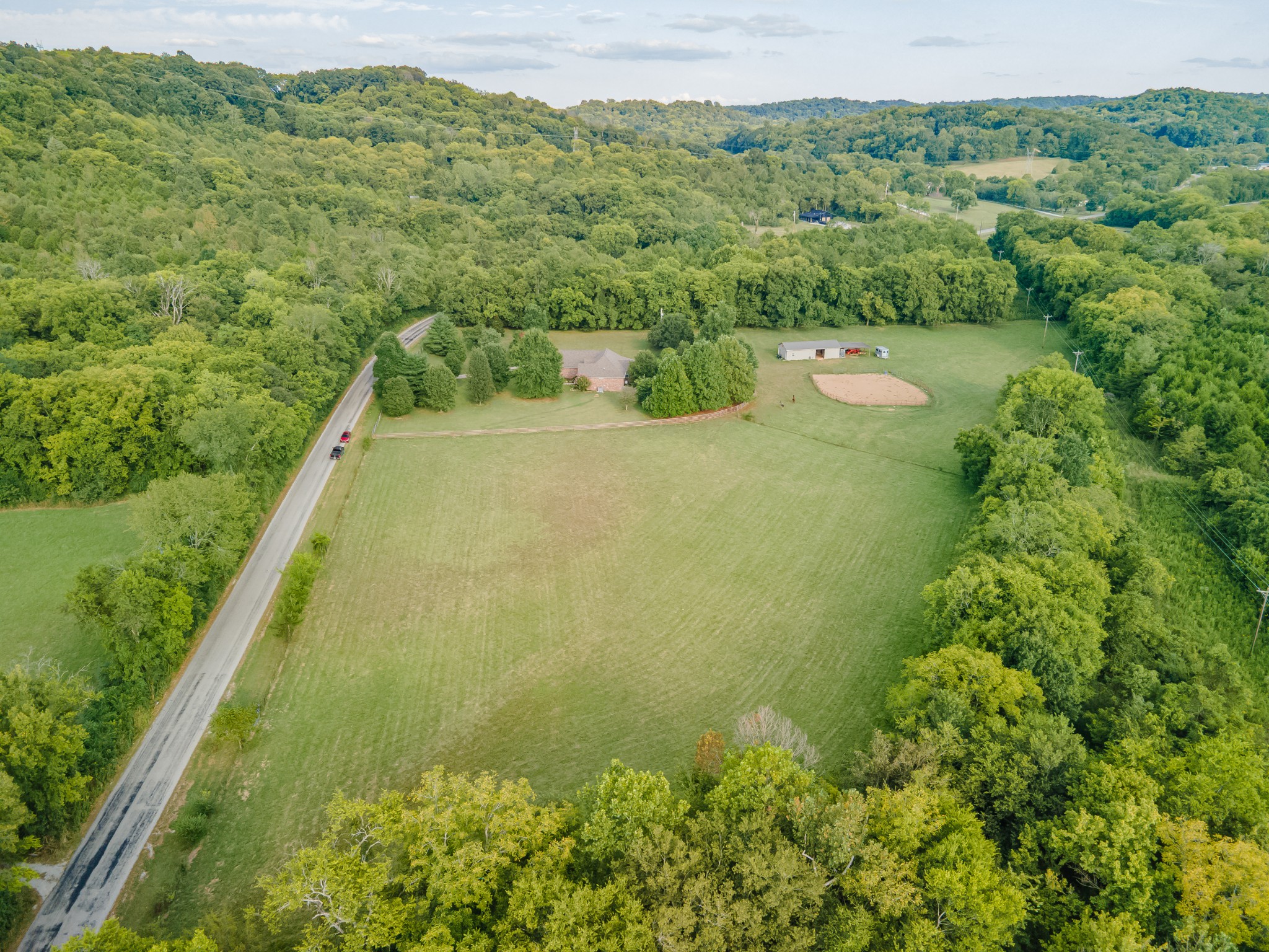 4862 Toll Dugger Road Culleoka, TN 38451 - Photo 78 of 96 a view of a lake with a mountain in the background