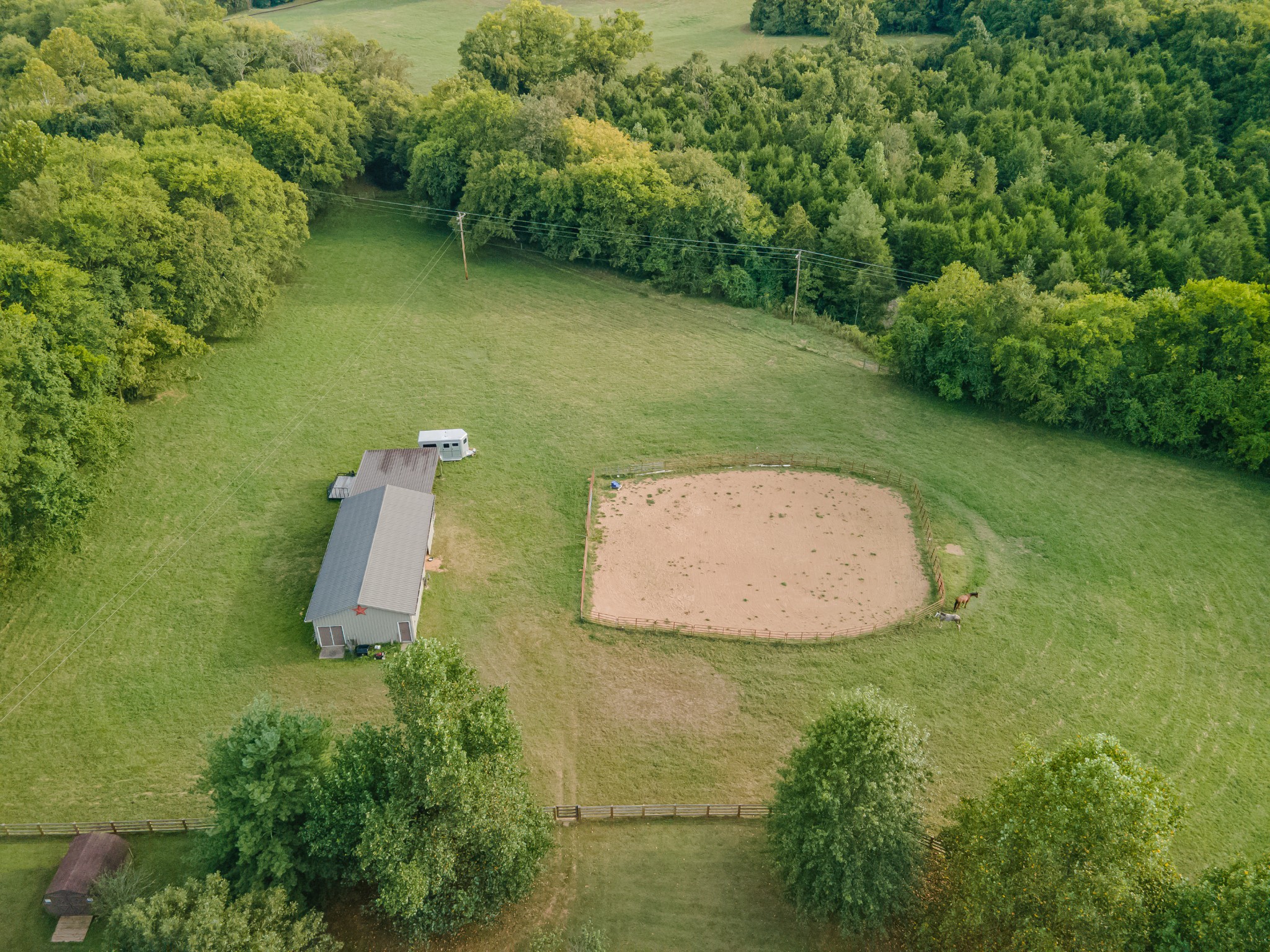 4862 Toll Dugger Road Culleoka, TN 38451 - Photo 10 of 96 an aerial view of a house with a yard and lake view