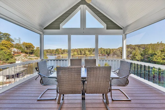 a spacious bedroom with a bed and a couch