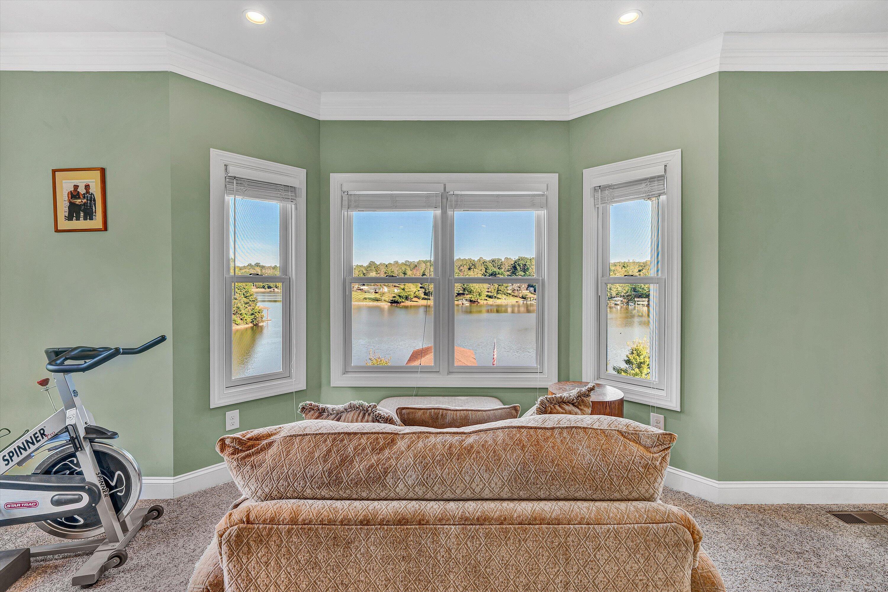 440 Augusta Way Wirtz, VA 24184 - Photo 20 of 63 a living room with a bed furniture and a window